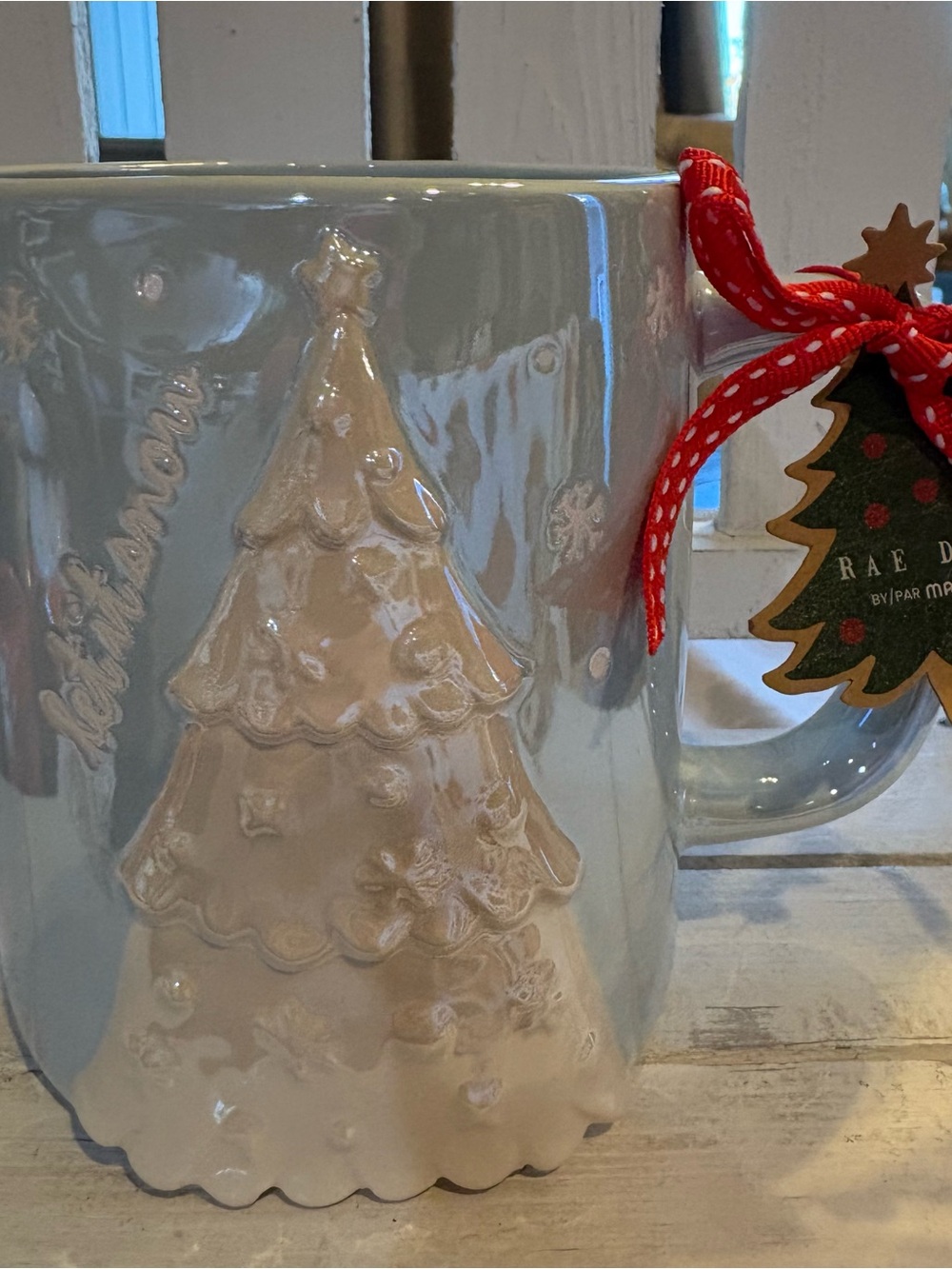 Rae Dunn Blue Ceramic Mug with Cream Tree and Red Ribbon